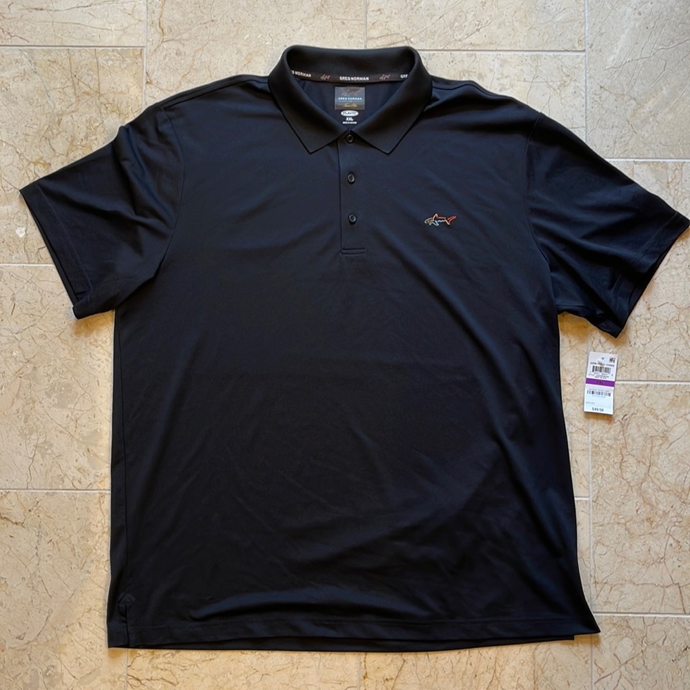 Black Greg Norman play dry polo shirt. New with tags